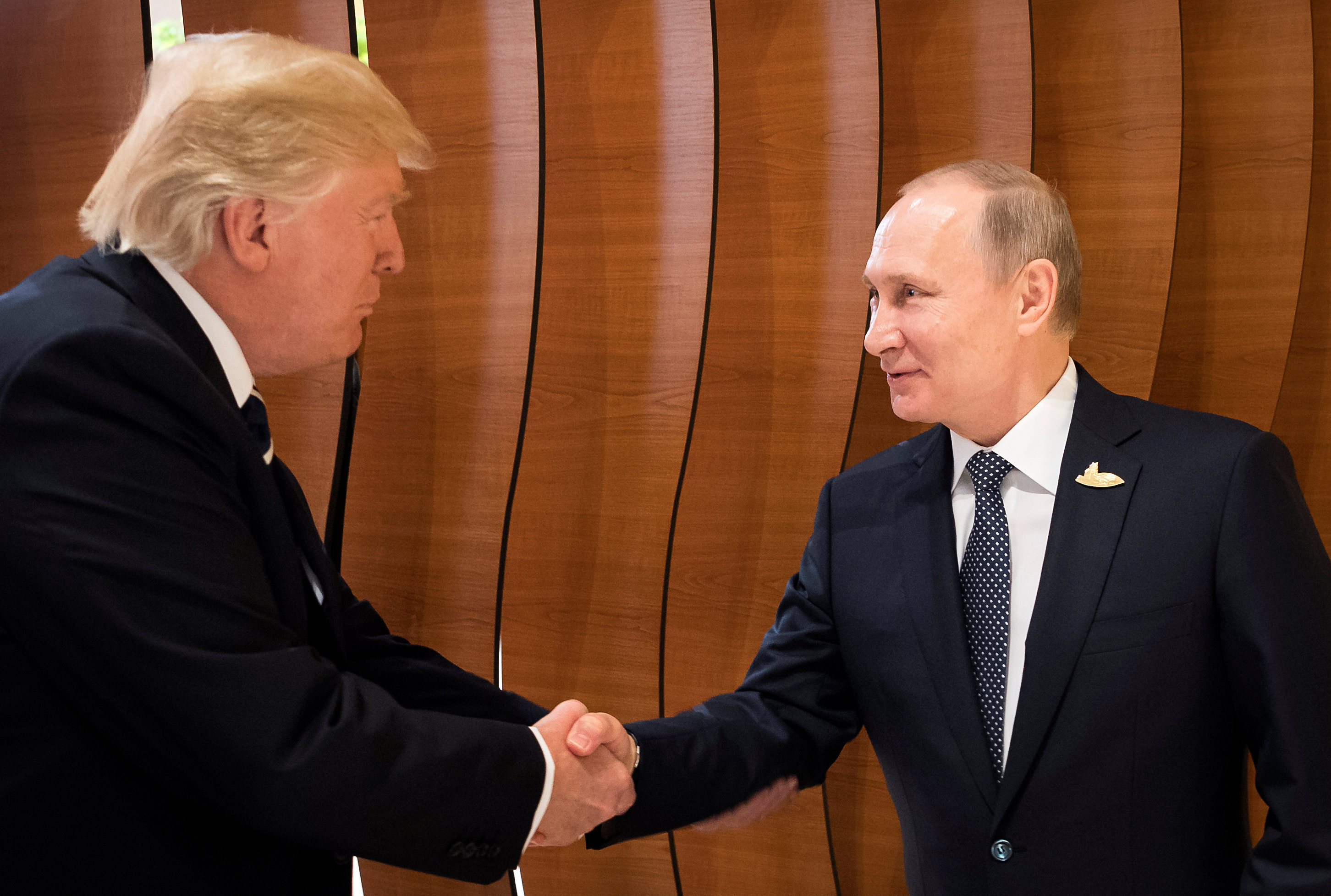 Президент США Дональд Трамп и президент РФ Владимир Путин. Фото: &copy;REUTERS/Steffen Kugler