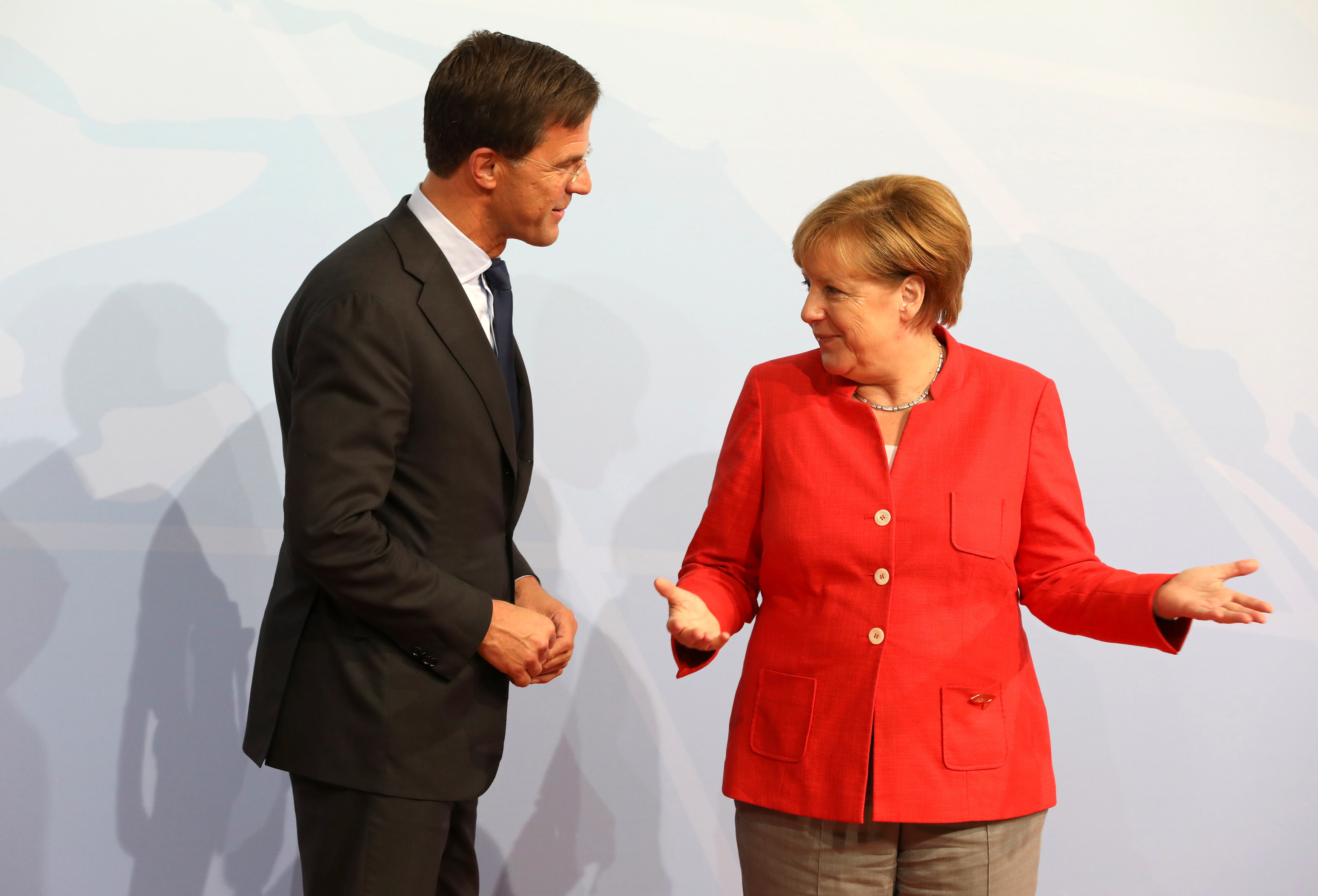 Ангела Меркель и Марк Рютте. Фото: © REUTERS/Ludovic Marin