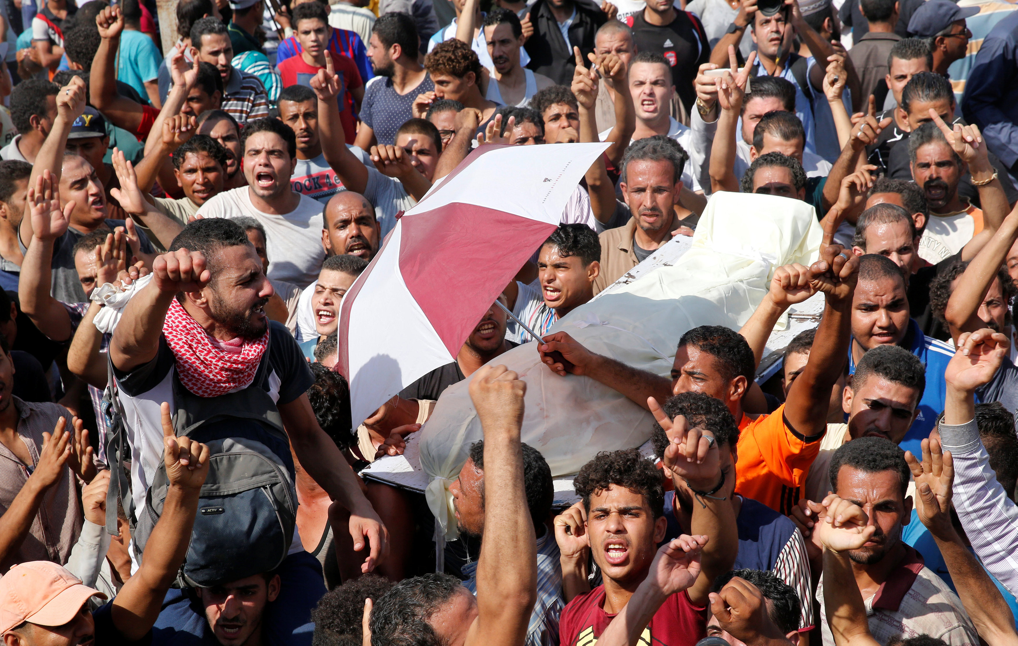 Похороны погибшего в столкновениях с полицией жителя района Аль-Варрак. Фото: &copy;&nbsp;REUTERS/Amr Abdallah Dalsh