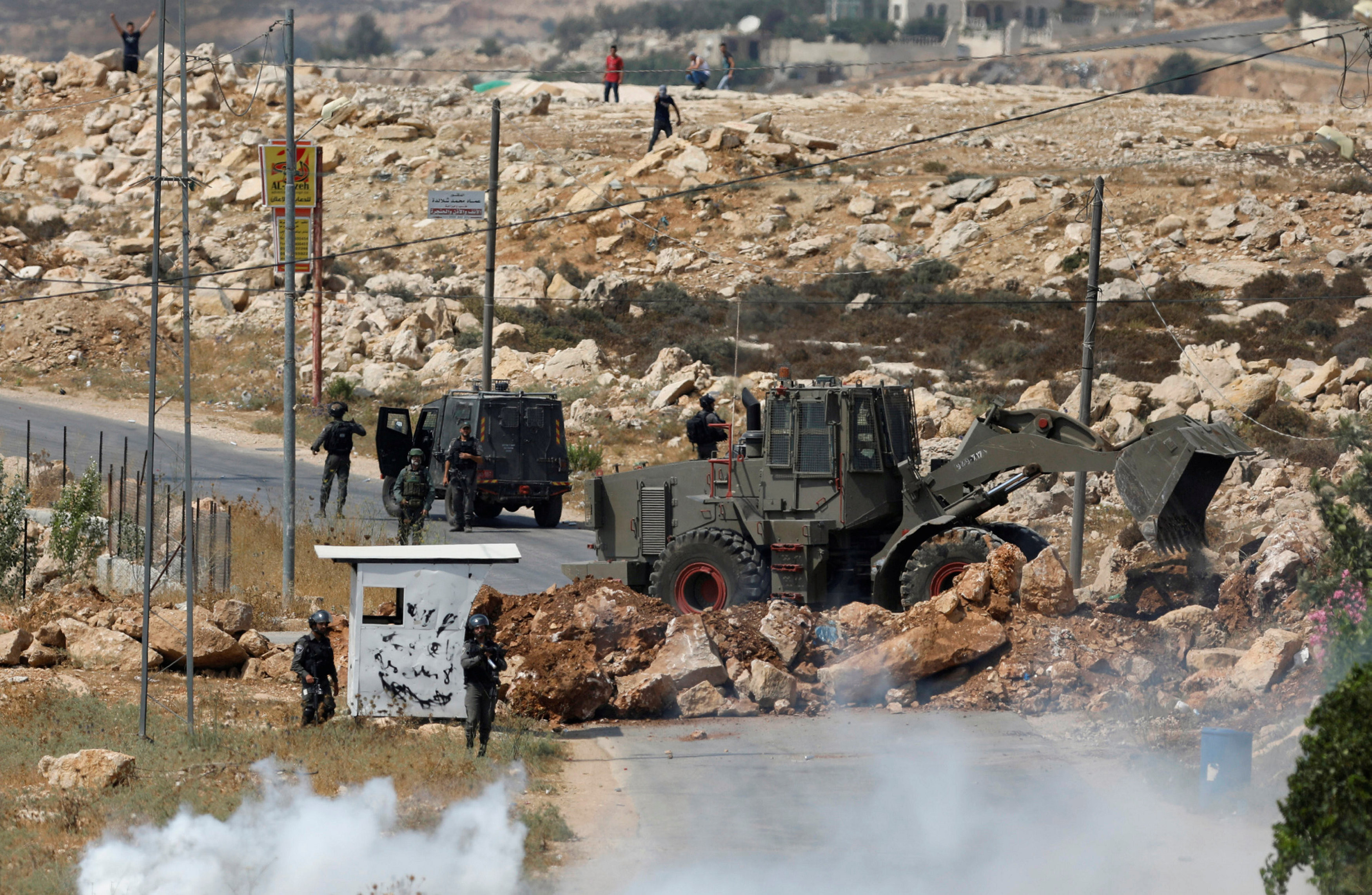 Израильские военные вступают в конфликт с палестинскими боевиками. Фото: &copy; REUTERS/Mohamad Torokman