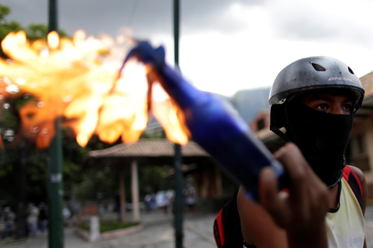Участник протестов в Венесуэле. Фото: &copy; REUTERS/Ueslei Marcelino