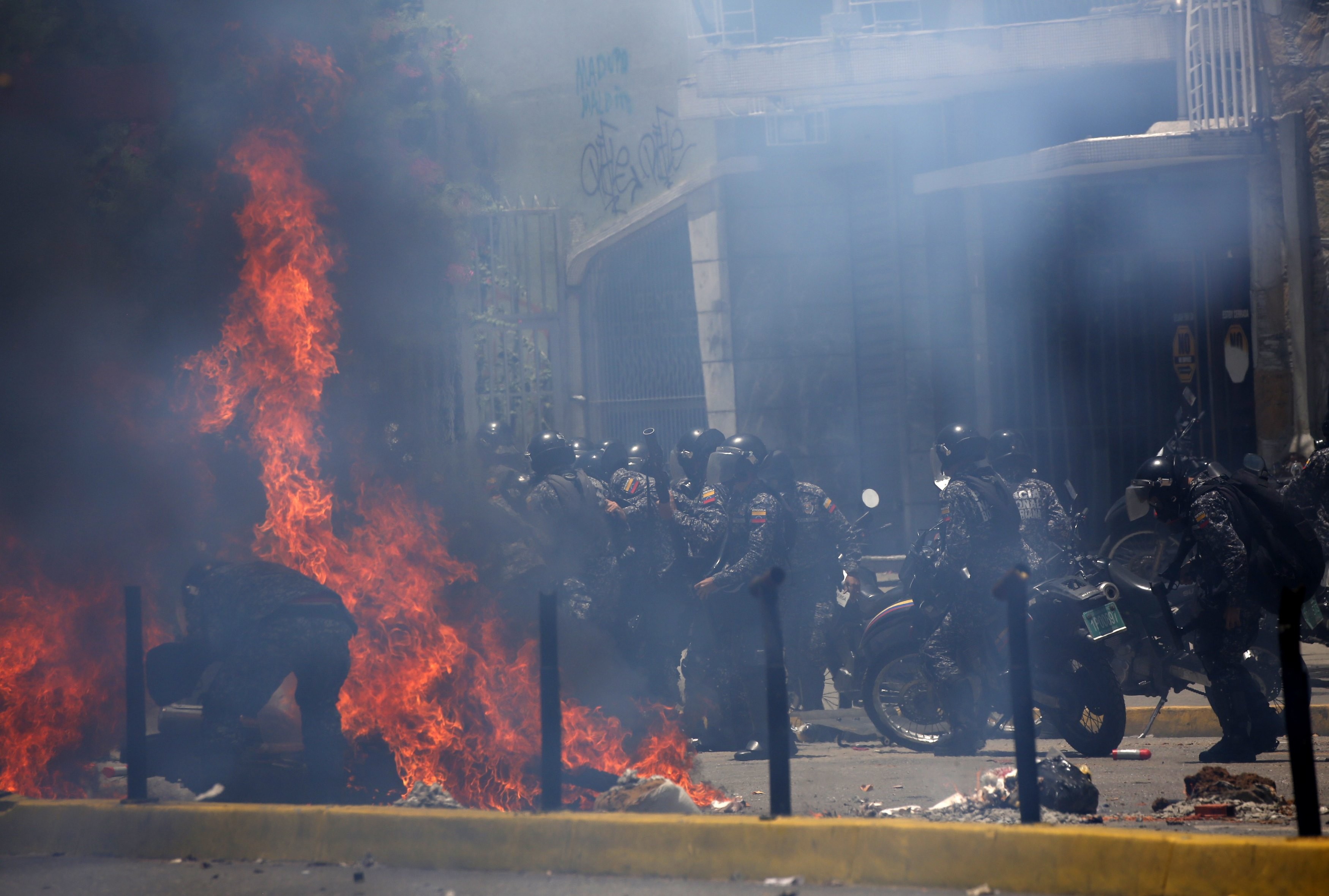 Акция протеста в Венесуэле. Фото: &copy;&nbsp;REUTERS/Carlos Garcia Rawlins