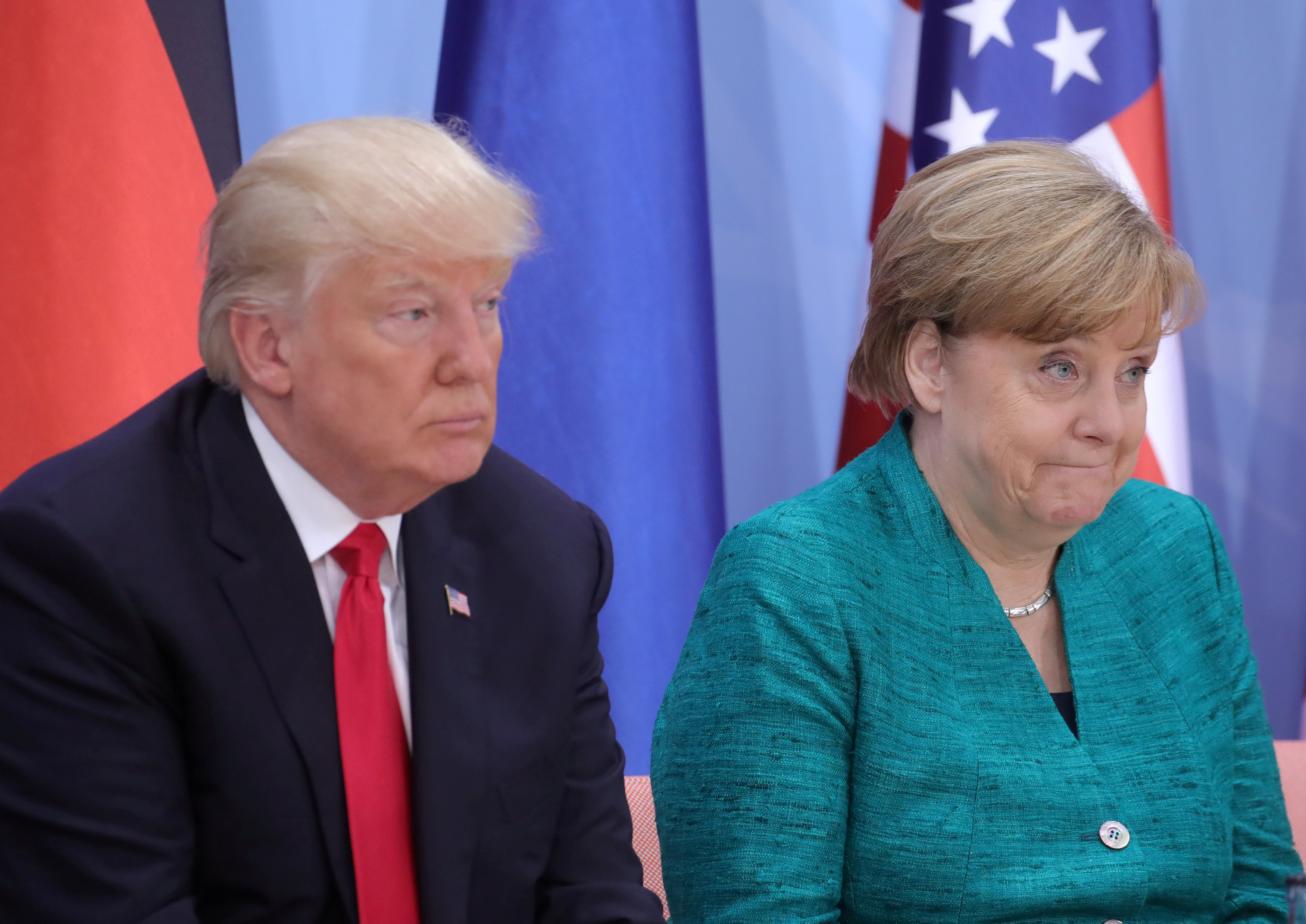 Президент США Дональд Трамп и канцлер ФРГ Ангела Меркель Фото &copy;&nbsp;REUTERS/Michael Kappeler/Pool/File Photo