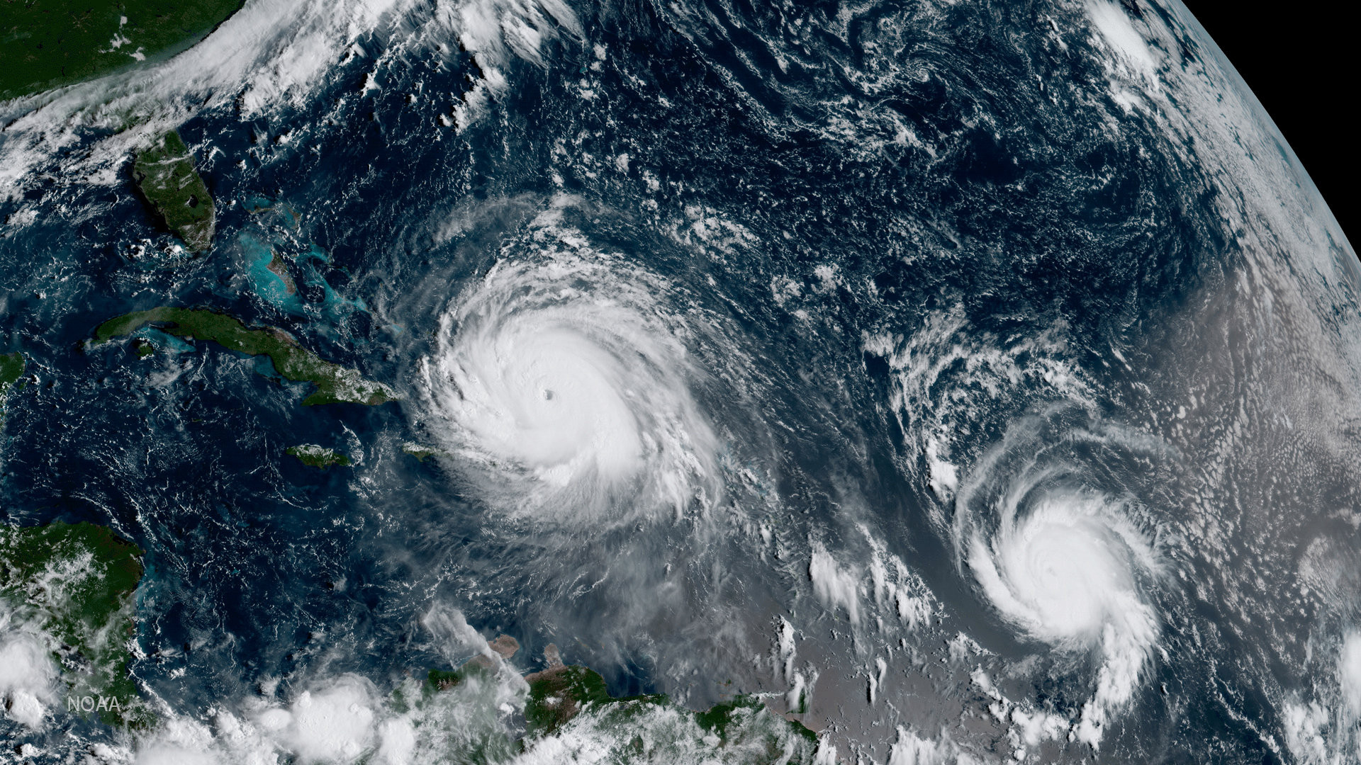 Ураган "Ирма" и ураган "Хосе" на снимке со спутника. Фото &copy; REUTERS