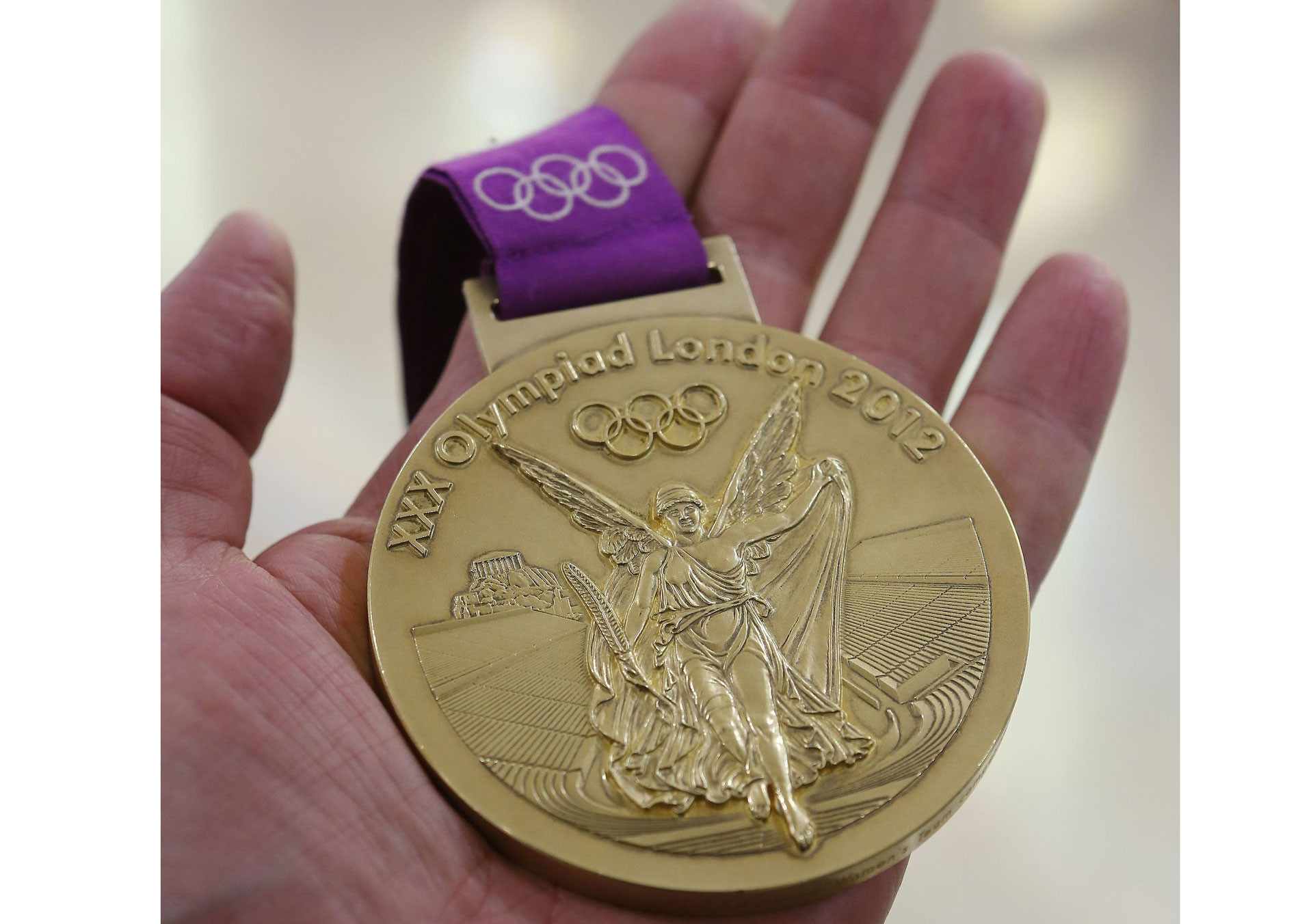 Золотая медаль Анжелики Тиманиной с Лондонской олимпиады 2012 г. Фото: © wikipedia.org/Вадим Смальков