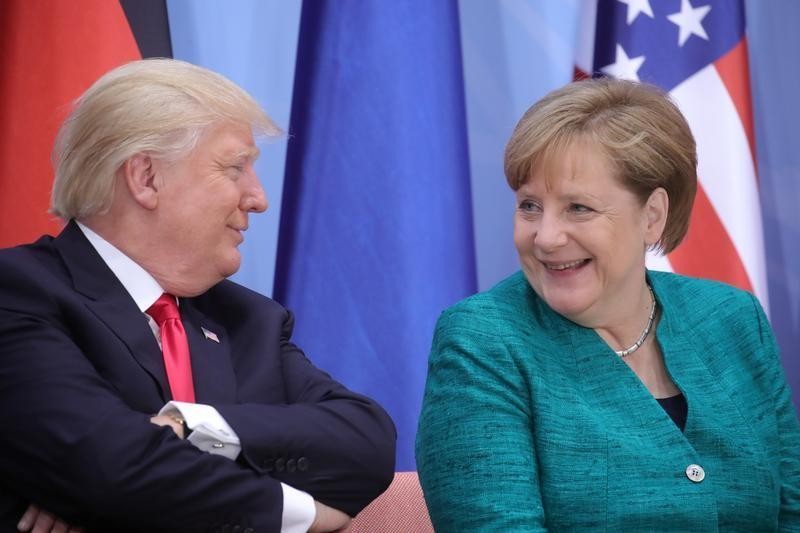 Дональд Трамп и Ангела Меркель. Фото: &copy; REUTERS/Michael Kappeler