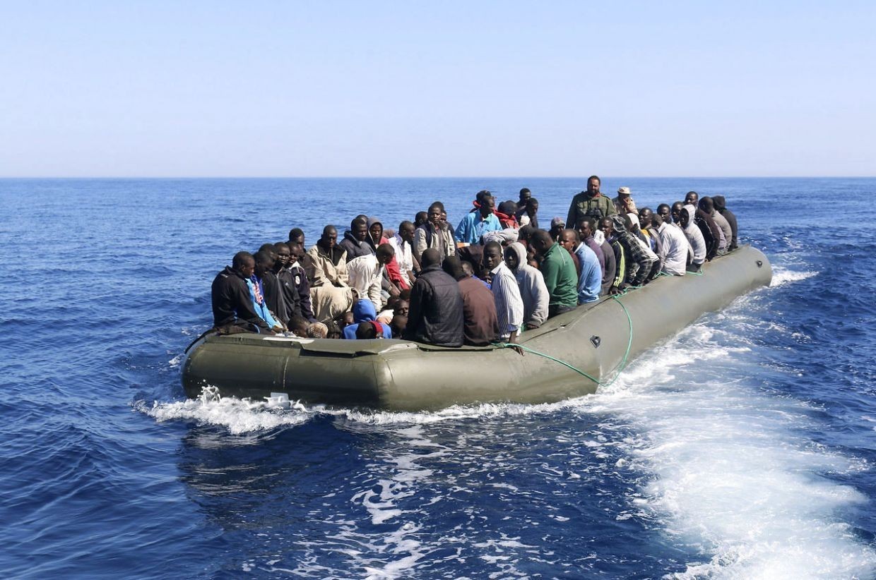 Африканские беженцы. Фото: &copy;&nbsp;REUTERS/Hani Amara
