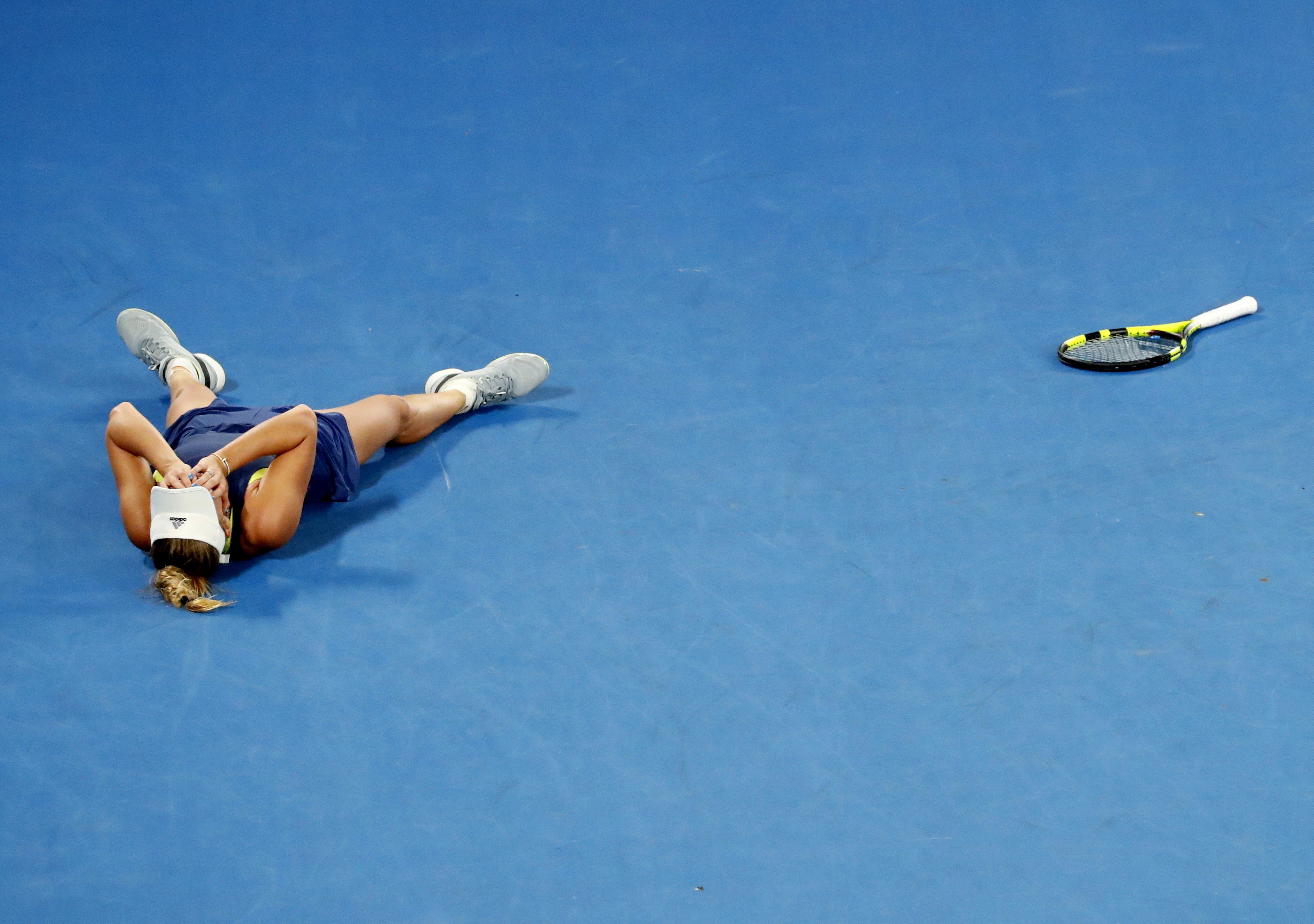 Эмоции Каролин Возняцки после победы на Открытом чемпионате Австралии. Фото: REUTERS/David Gray