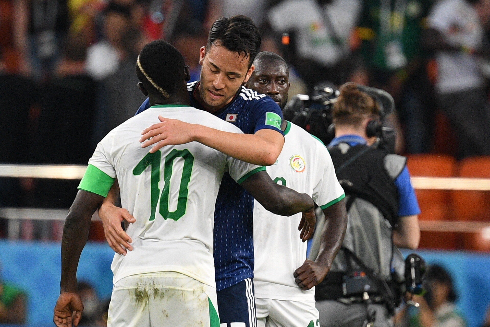 Футболисты сборной Японии и Сенегала. Фото: РИА Новости / Владимир Астапкович