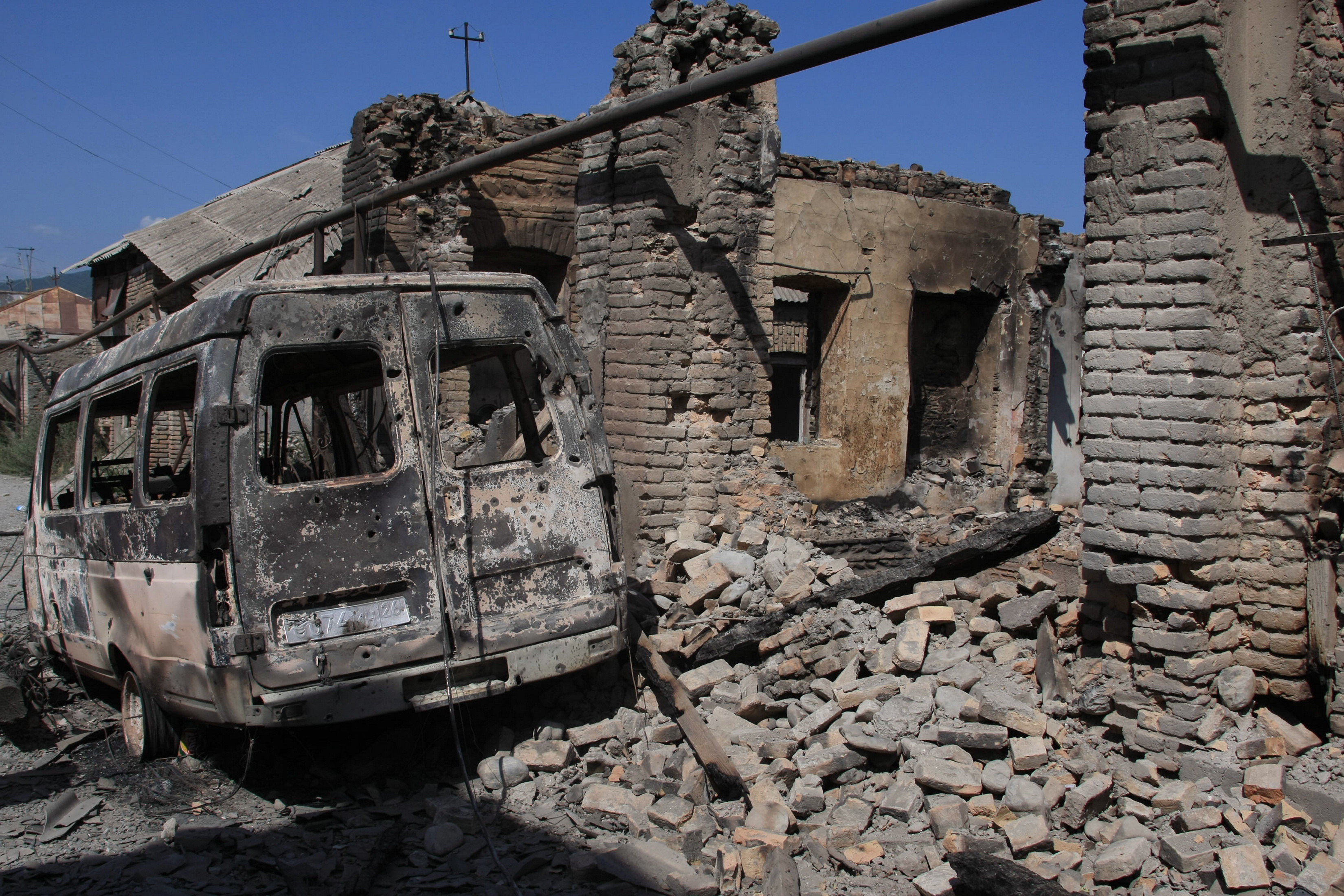 Разрушенные дома в Цхинвале, 2008 год. Фото: &copy; РИА Новости/Михаил Фомичев