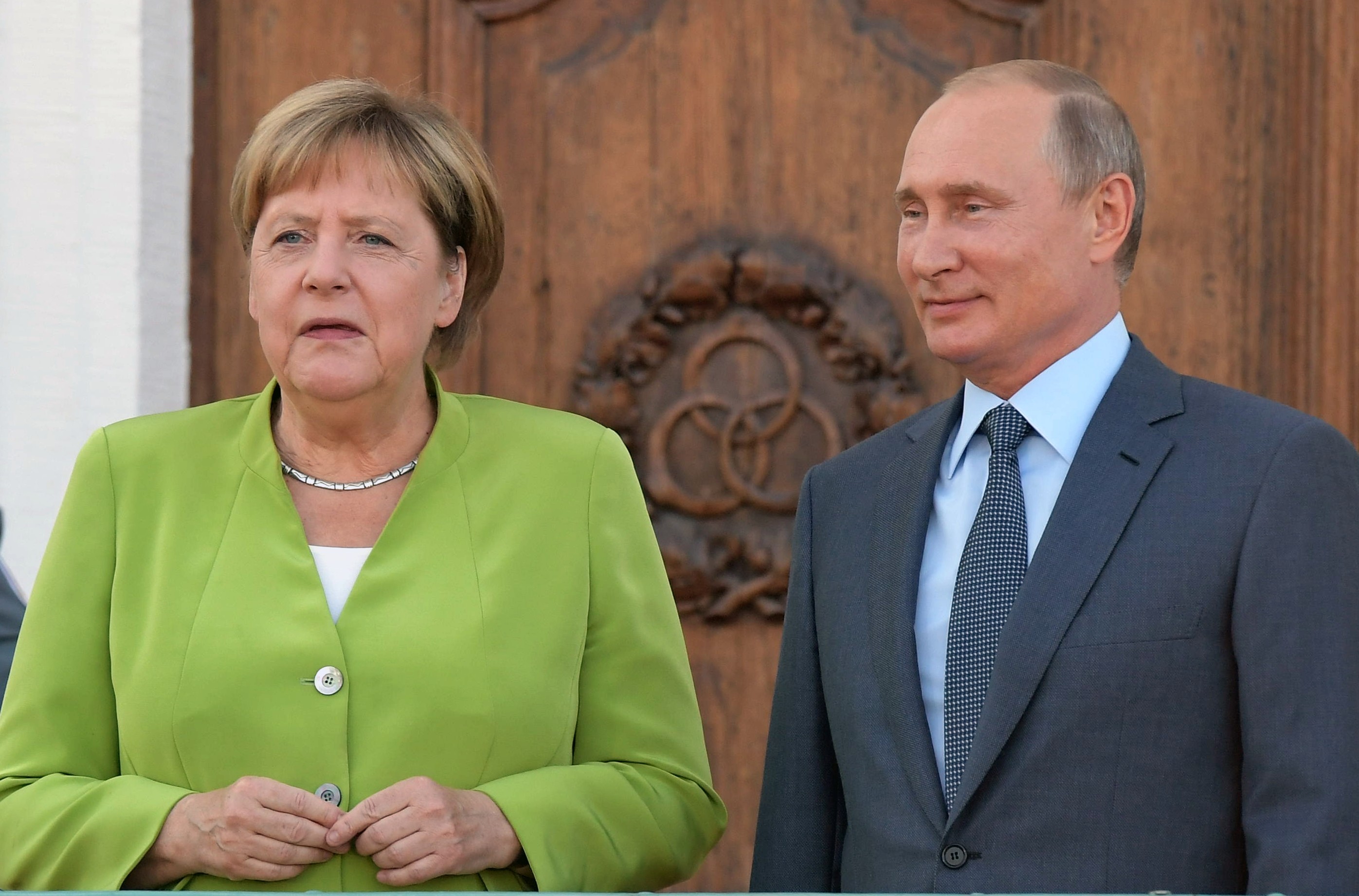 Канцелр Германии Ангела Меркель (слева) и президент России Владимир Путин (справа). Фото: &copy; РИА Новости / Сергей Гунеев