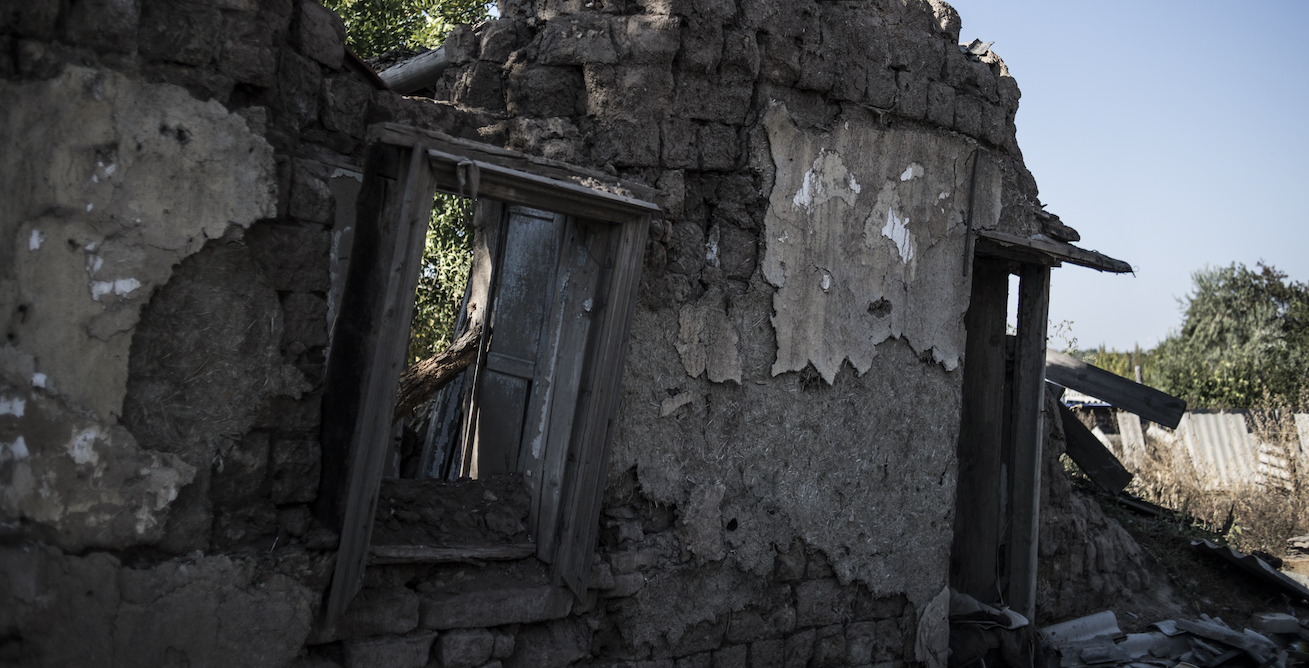 Один из разрушенных домов в Старомихайловке. Фото: &copy;РИА Новости/Валерий Мельников