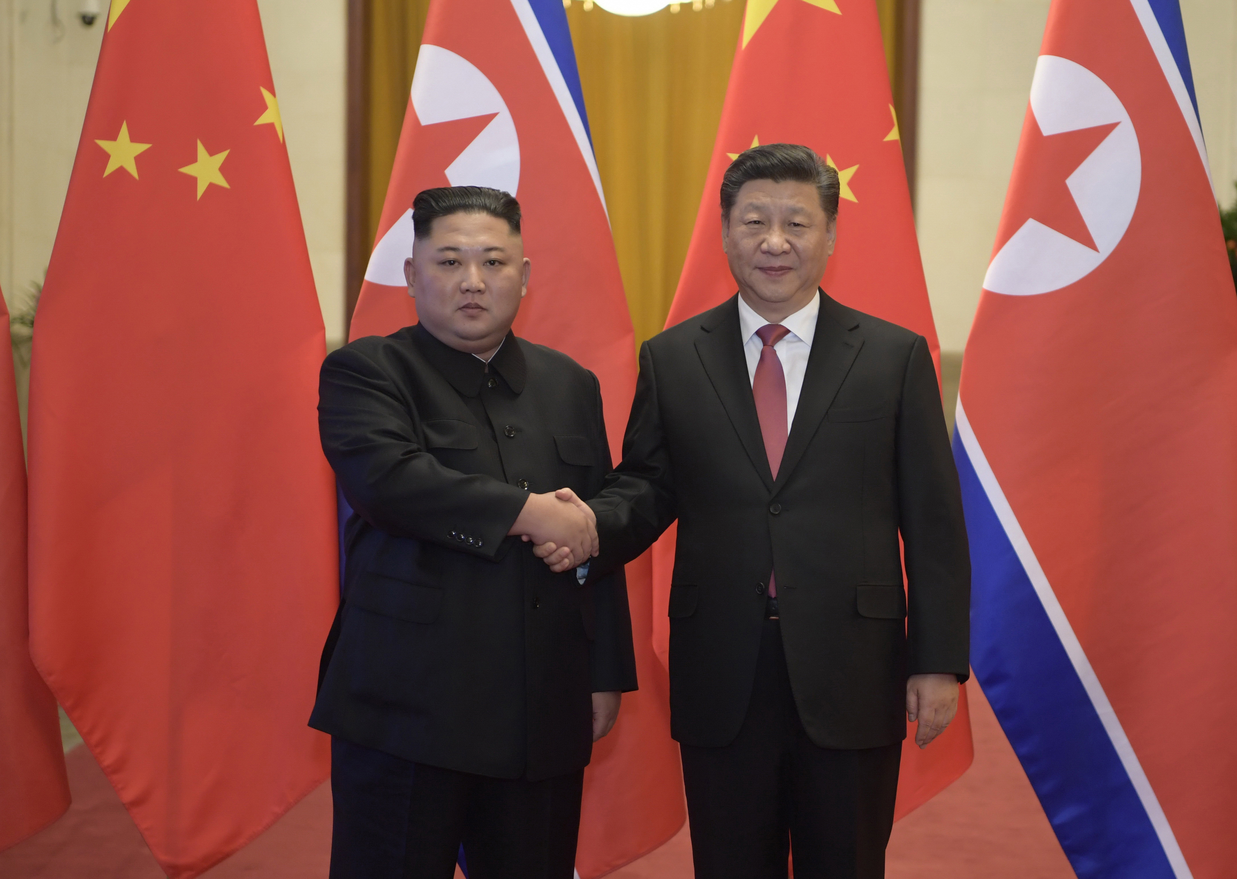 Ким Чен Ын и Си Цзиньпин. Фото: &copy; AP Photo/Li Xueren