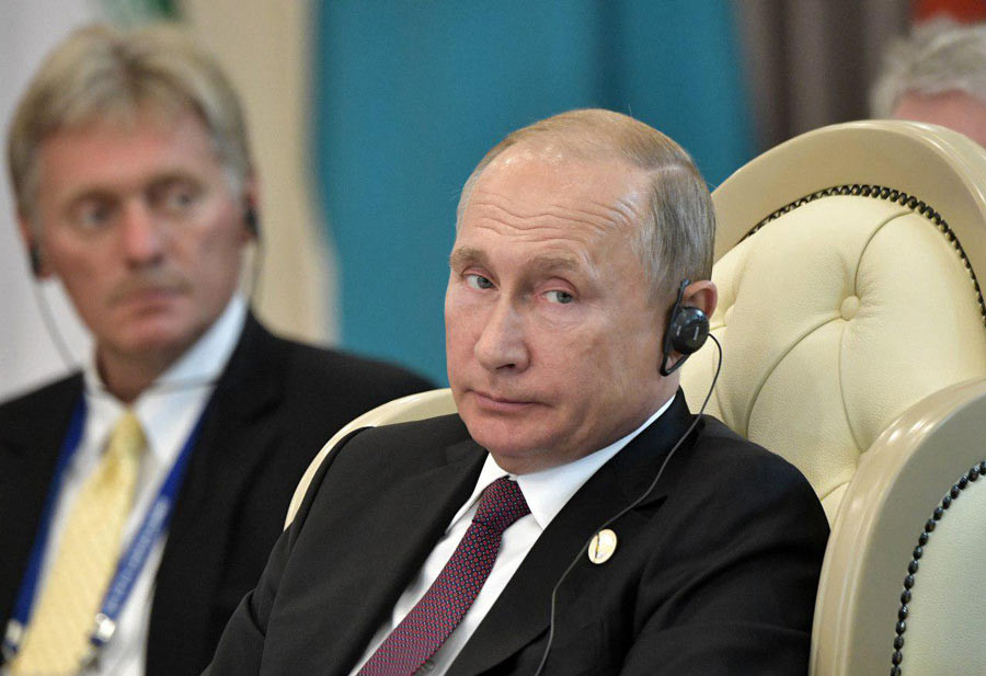 Дмитрий Песков и Владимир Путин. Фото: © РИА Новости/Алексей Никольский

