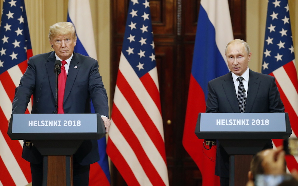 Президент США Дональд Трамп и президент России Владимир Путин. Фото © EPA\TASS / Anatoly Maltsev
