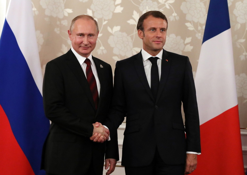 Владимир Путин, Эмманюэль Макрон (справа). Фото © ТАСС / Михаил Климентьев
