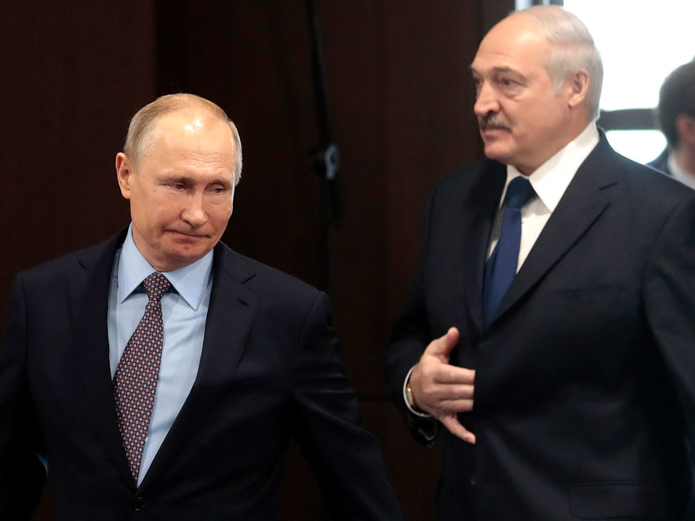 Президент России Владимир Путин и президент Белоруссии Александр Лукашенко. Фото © Sergei Chirikov / Pool Photo via AP
