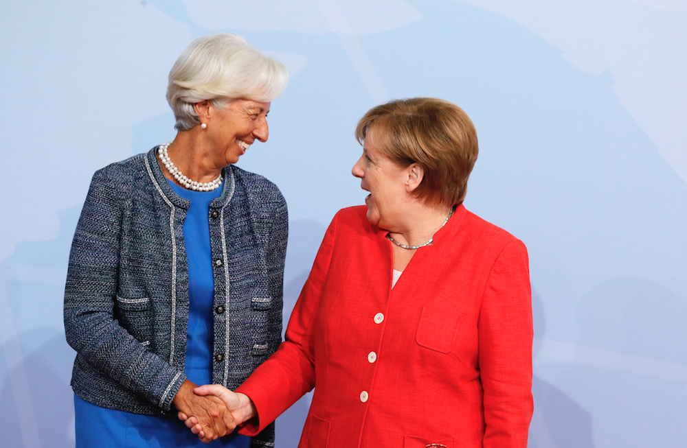 Кристин Лагард и Ангела Меркель (справа). Фото © ТАСС / Метцель Михаил
