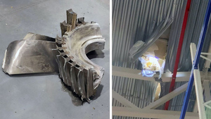 Деталь аварийного Ан-124 пробила крышу здания — фото 