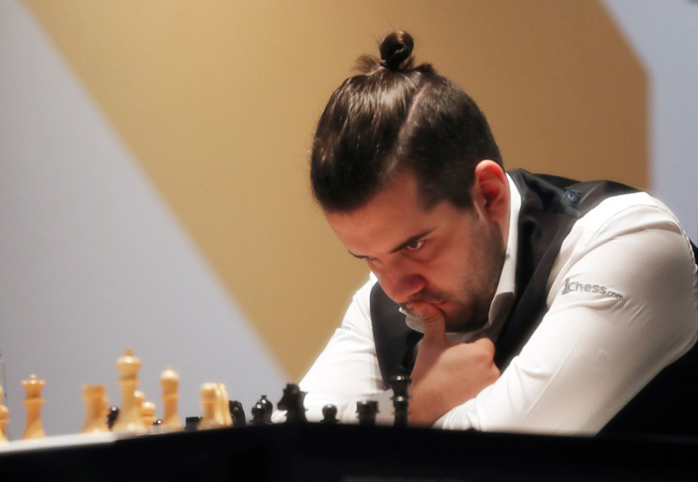Непомнящий и Карлсен завершили третью партию подряд вничью в матче за шахматную корону