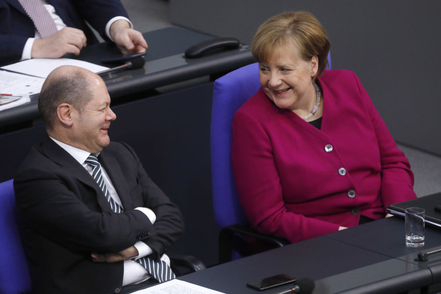 Олаф Шольц и Ангела Меркель © Michele Tantussi / Getty Images