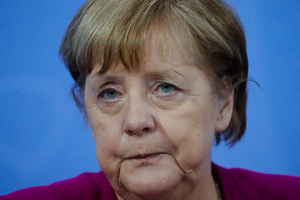 Партия Меркель терпит поражение на региональных выборах в Германии