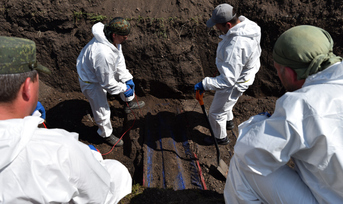 Останки ещё семи жертв конфликта в Донбассе извлекли из братской могилы