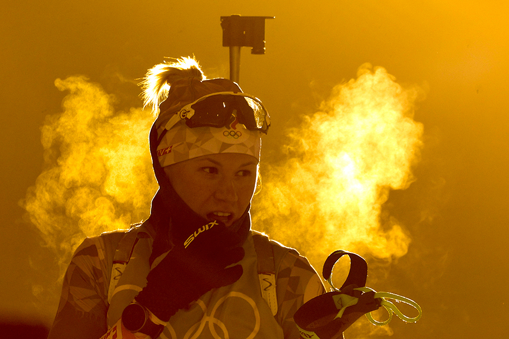 Биатлонистка Кристина Резцова во время тренировки. Фото © ТАСС / Сергей Бобылев