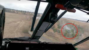 Появились кадры работы ударной группы Ка-52 при высадке десанта РФ на украинский аэродром