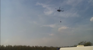 Вертолёты Ми-8 привлекли к тушению крупного лесного пожара в Новосибирской области