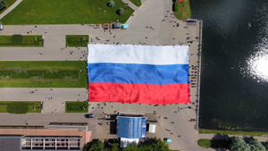 Почти 1,5 тысячи "квадратов": В Москве развернули гигантский флаг России