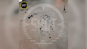 В Анапе женщина попыталась поджечь банк с криками "Слава ВСУ!". Фото © Telegram / SHOT