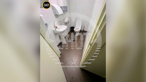 В Анапе женщина попыталась поджечь банк с криками "Слава ВСУ!". Фото © Telegram / SHOT