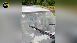 Автомобиль пары из белгородского села Глотово, обстрелянный украинскими диверсантами. Фото © t.me / SHOT