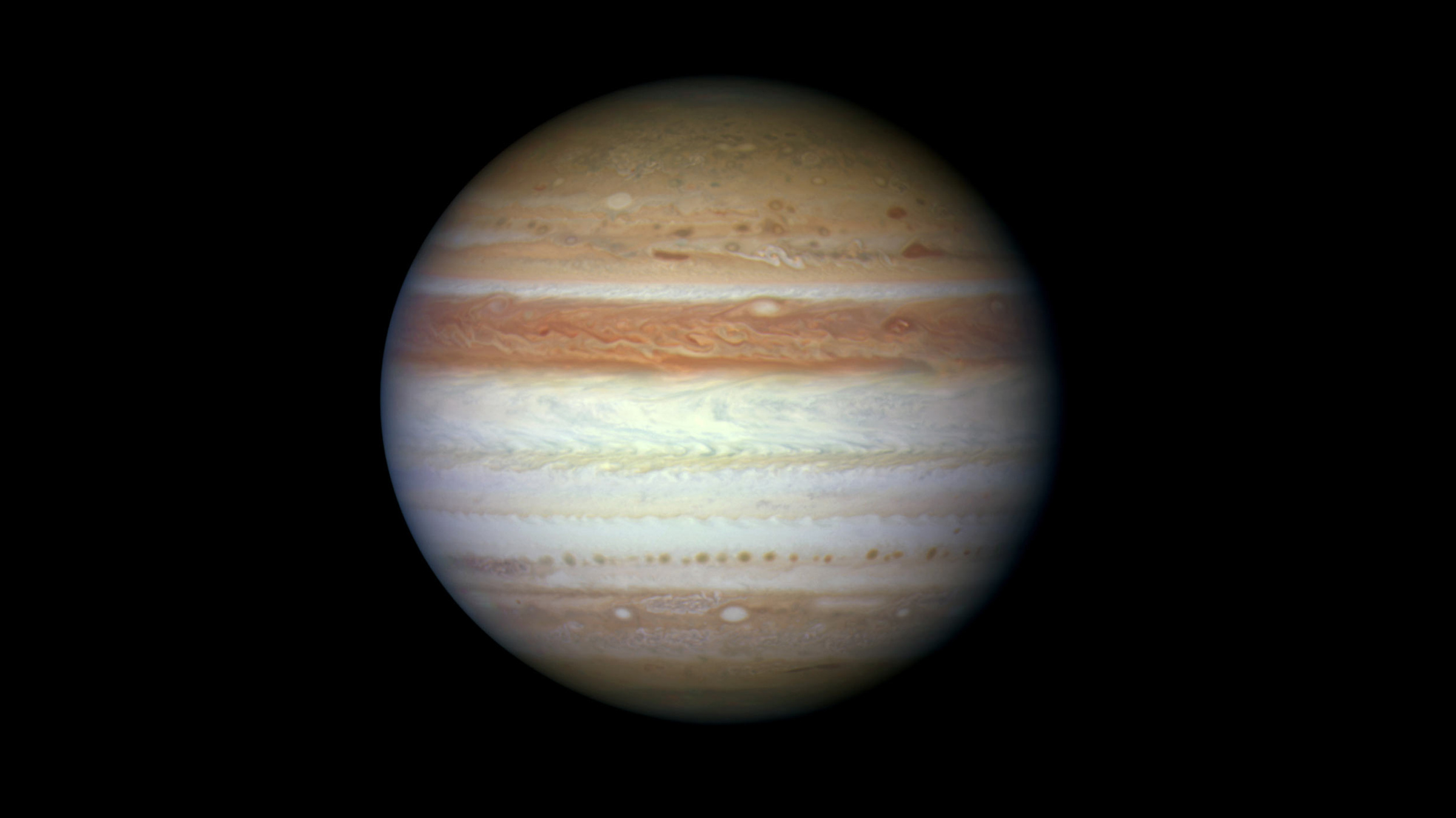 Юпитер летом 2010 года на снимке телескопа Hubble. Фото © Wikipedia / NASA / Johns Hopkins