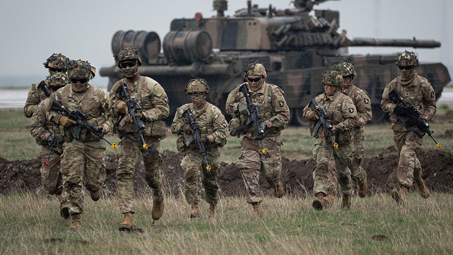Как Киев добивается вступления НАТО в конфликт с Россией. Обложка © ТАСС / AP / Vadim Ghirda
