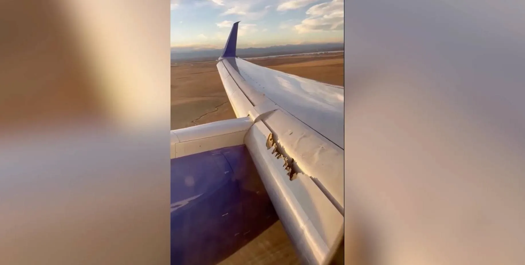 Пассажир в ужасе снял из иллюминатора, как у самолёта в полёте начало отрываться крыло