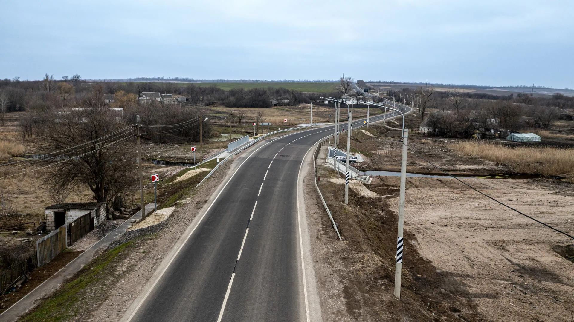 Завершено капитальный ремонт моста на трассе Амвросиевка  Мариуполь