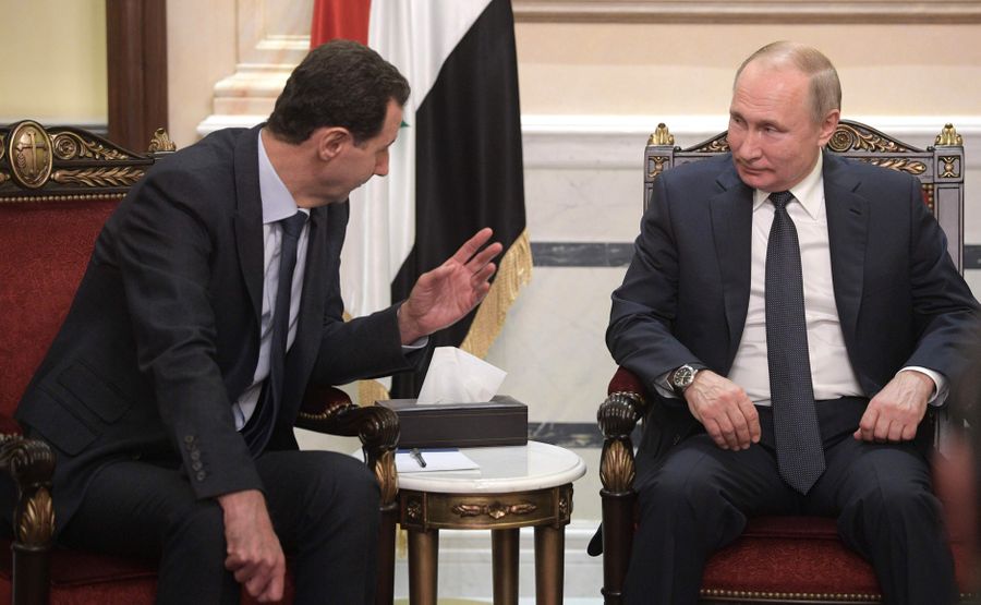 Президент России Владимир Путин и президент Сирии Башар Асад (слева). Фото © Kremlin